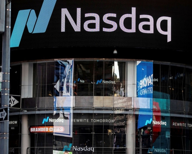 The NASDAQ vuilding, nasdaq and S&P 500 reached record highs as GDP data came in