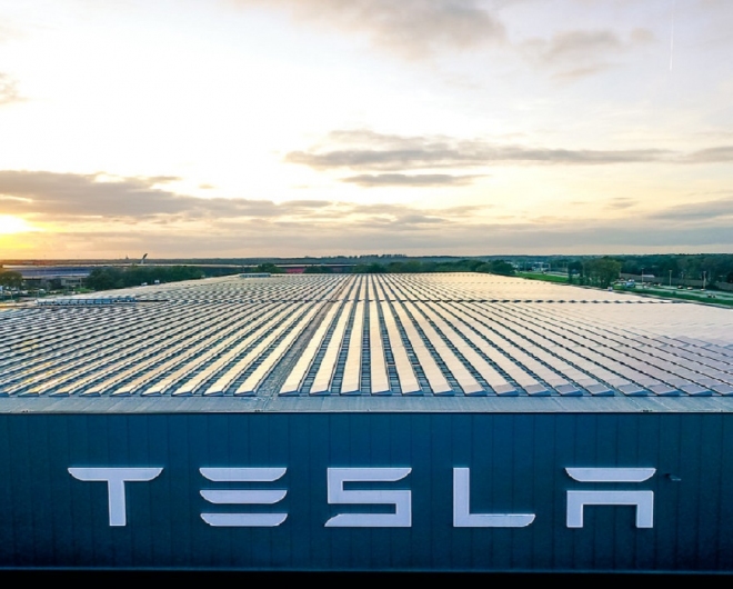 View of Tesla factory. Tesla shares fell drastically and the NASDAQ fell along with it